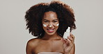 Skincare, cream and face with woman in studio for beauty, hydration and self care. Cosmetics, glow and dermatology with African person on white background for shine, spa treatment and facial lotion