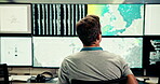 Man, computer and screen with satellite in control room, monitor weather and climate change. Back, meteorologist and online alert of hurricane update, study storm pattern and surveillance of disaster