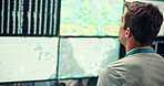 Computer screen, review and man with data in office for satellite, forecast or weather prediction. Research, broadcast and male climatologist with meteorology information on technology in workplace.