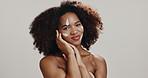 Face, black woman and lotion for skincare, cosmetics and spf cream on white studio background. Portrait, African model and silly person with dermatology, sun protection and treatment for funny joke