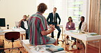 Professor, applause and college with man in classroom for education,  speaker and presentation. Learning, knowledge and teacher with people or University students for studying and scholarship
