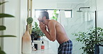 Man, cleaning and mirror with tap, skincare with facial hygiene and grooming in morning routine. Anti aging cosmetics, reflection or person in bathroom with basin, wellness or face treatment in home