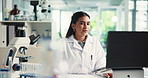 Scientist, microscope and woman on laptop for research, drug development or typing experiment results. Computer, science or microbiology for medical test, healthcare innovation or pharma study in lab