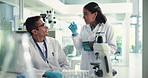 Discussion, tablet and team of scientists in laboratory for pharmaceutical research, test or innovation. Science, digital technology and biologists in collaboration for medical vaccine experiment.