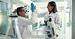 High five, partnership and team of scientists in laboratory for pharmaceutical discovery, test or experiment. Science, technology and biomedical engineers with celebration for vaccine innovation.