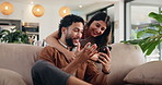 Happy couple hug, talking and mobile in home for wow, online shopping or surprise purchase for sale. Man, woman and typing on phone on sofa to relax for streaming service, social media or show video