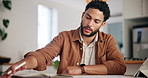 Man, review notes and tablet with calendar for planning schedule, tasks reminder and appointment. Male person, digital and notebook for annual agenda, time management and publishing deadline at house