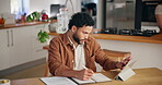 Home, man and notes with tablet for research, planning and schedule with writer for remote work. Freelancer, male person and digital with book for writing, article tips and information for journalist