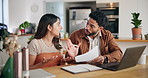 Couple, paper and stress with fight for finance, bills and debt crisis with taxes in home kitchen. Laptop, man and woman with argument for budget, bankruptcy and conflict for payment fail or expenses