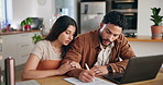 Couple, documents and signature for insurance in home, mortgage application and financial form. Laptop, man and woman sign contract for loan agreement, tax return and conversation to help with policy