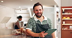 Business owner, man and face with tablet in restaurant for customer service, menu planning or website review. Hospitality, happy person or digital app in cafe for inventory checklist and stock order