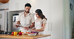 Cooking, tablet and couple with vegetables in kitchen for online recipes for dinner, lunch and meal prep. Home, food and man with woman on digital tech for healthy eating, nutrition and wellness