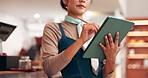 Business owner, woman and writing on tablet in cafe for online management, menu planning or workflow roster. Hospitality industry, hands or digital app in coffee shop for stock checklist or inventory