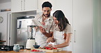 Fruit, strawberry and couple in kitchen on tablet for healthy eating, nutrition and breakfast drink. Home, online recipe and man and woman with berries for wellness, organic diet or vitamin smoothie 