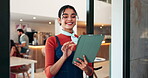 Small business, woman and tablet by cafe door for welcome, customer service and order management. Hostess, manager and happy with digital app for seating plan, hospitality and restaurant entrance
