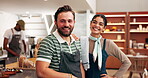 Waiter, face and happy with teamwork in cafe for customer service, friendly hospitality and small business. Server, people and laughing in coffee shop for funny joke, bakery support and entrepreneur