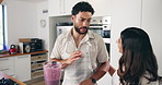 Couple, talking and fruit smoothie in blender for breakfast drink, support and nutrition of healthy diet. People, embrace and organic ingredients of protein juice, weight loss and gut health at house