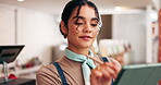 Business owner, woman and writing on tablet in cafe for inventory management, menu planning or website review. Hospitality, happy person and digital app in diner for stock checklist and online order