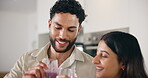 Happy, couple and drink smoothie in kitchen, bonding together and nutrition with healthy diet. People, talk and nutritionist with organic ingredients for protein juice, weight loss and detox at house