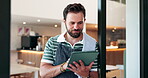Small business, waiter and tablet by cafe door for welcome, customer service or reading website review. Startup, manager and happy with digital app for seating plan, hospitality and order management