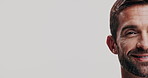 Skincare, half face and man in studio with mockup space for natural, hydration and health routine. Happy, cosmetic and portrait of male person with facial dermatology treatment by white background.
