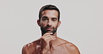 Skincare, confident and face of man in studio for natural, health and facial routine for glow. Portrait, hygiene and male person from Brazil with hydration dermatology treatment by white background.