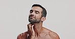 Beard, irritation or scratching and shirtless man in studio with symptoms of contact dermatitis or eczema. Allergies, dermatology or folliculitis and person on white background with reaction to itch