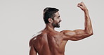 Back, bicep and laughing with shirtless man in studio for fitness, masculinity or strength. Arm, exercise and muscle with body of funny model on white background for training or workout results