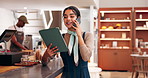 Happy woman, waitress or phone call with tablet at cafe for online order, customer service or booking. Female person, bistro or employee with smile on mobile smartphone or technology for reservation