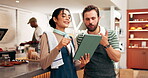 Waiter, teamwork and discussion with tablet in restaurant for barista training, counting stock or help with online system. Hospitality industry, people and digital tech for workflow and manage order