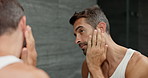 Beard, hair care and man in bathroom, mirror and grooming with treatment for shine. House, beauty and person with skincare, hygiene and maintenance with health spa facial, aesthetic and reflection