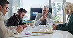 Meeting, business people and man with feedback in office, briefing and expansion for global trade. Boardroom, employees and mature market manager with discussion for sales project, report or teamwork