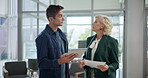 Finance, discussion or business people with tablet in lobby for budget project, teamwork or capital growth. Investor, policy update or financial advisor with executive director or documents in office