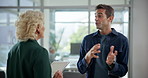 Discussion, feedback or business people with tablet in office for budget project, teamwork or capital growth. Proposal, report or financial advisor with mature executive director or investor in lobby