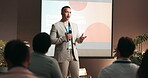 Conference, audience and businessman with mic for talking, training or workshop for employees health. Crowd, presenter and program with speech for seminar, presentation or workplace wellness on stage