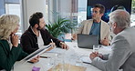 Business people, discussion and meeting for proposal, project or planning in collaboration. Investor, executive director or mature financial manager with sales budget report, teamwork or global trade