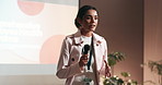 Seminar, speaker and businesswoman on stage with presentation on leadership development in office. Mic, public speaking and female hr director with pitch at corporate conference, event or workshop.