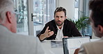 Business people, documents and conversation in meeting, feedback for financial report. Employees, team and group with planning, performance review and economy analyst with discussion and cooperation