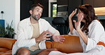Frustrated couple, argument or discussion with fight on sofa for disagreement, divorce or breakup at home. Man, woman or seperation with conflict in dispute for toxic relationship or affair at house
