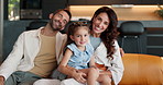 Happy family, face and relax with hug on sofa for holiday, weekend or bonding at home. Portrait, mom and dad with daughter or smile on living room couch for love, care or security together at house