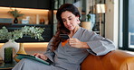 Woman, online shopping or tablet with credit card on sofa for payment, remote banking or app at home. Female person, shopper or customer with smile on technology for fintech, purchase or ecommerce