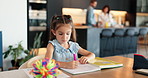 Young girl, drawing or book with color for homework, fun activity or creativity on table at home. Child, kid or student learning with textbook for creative project, assignment or assessment at house