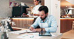 Business people, coffee and writing with documents at cafe for b2b, partnership or startup together. Happy, businessman and woman with beverage or serving for meeting, discussion or review at shop