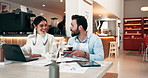 Business people, coffee and laptop with documents at cafe for b2b, partnership or startup together. Happy, businessman and woman with beverage or serving for meeting, discussion or review at shop