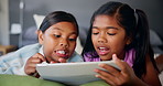 Relax, happy and kids on tablet on bed for online entertainment, watching cartoons and games. Family home, siblings and sisters on digital tech for streaming videos, bonding or playing in bedroom