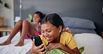 Happy, watching and child with smartphone, home and laughing at funny videos, social media and online. Bedroom, streaming and girl with mobile for movies, digital and kid with tech for entertainment