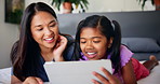 Tablet, mother and child talking in bedroom for relax, scroll ebook and bonding together in family home. Kid, girl and mom with digital technology for learning online, language app and education