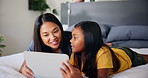 Tablet, mother and child talking in home for movie choice, ebook and bonding together in family bedroom. Kid, happy girl and mom with digital technology for learning online, game app or watch cartoon