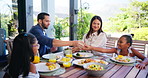 Family dinner, parents and serving with juice for happy conversation, love or bonding together on patio. Father, mother and daughter for lunch, chat or relax with care, smile or laugh outside house