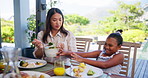 Vegetables, upset and mother dish for child outdoor on patio for healthy lunch together. Nutrition, disagreement and mom helping girl kid with no expression for broccoli with diet meal at home.